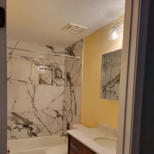 shower tile in yellow bathroom