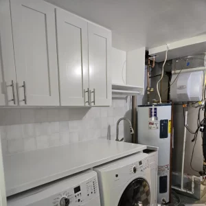 Laundry room with new cabinets