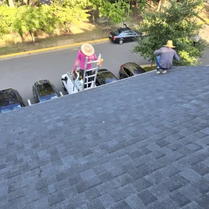 roofing installation and repair man on ladder