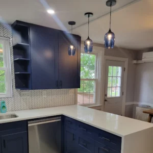 Blue Cabinets in kitchen remodel bar area